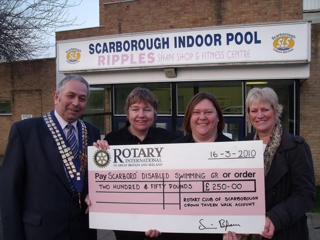 Scarborough Rotary Club President Simon Green, Wendy Cook and Julie Knight from the Disabled Swimming Group, and Rotary Crown Tavern Walk Committee Chairman Jane Moment in 2010; the club had been handed an additional boost with Gift-aided cash from the annual walk.