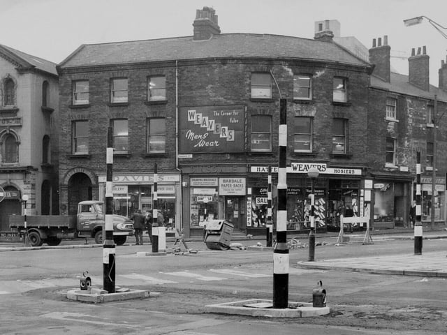 Traffic lights were being put up at the junction of Cookridge Street and Woodhouse Lane.