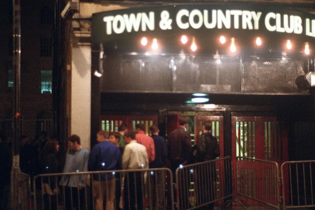 These scene - queuing to get into the Town and Country Club-  will be familiar to a generation of city centre revellers.