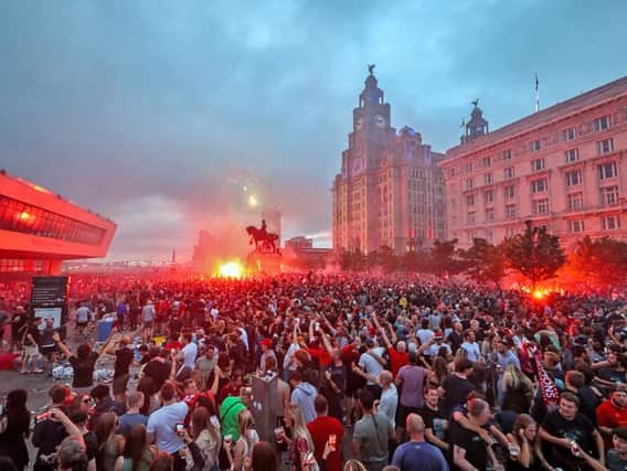 Fireworks go off outside the Liver Building in Liverpool