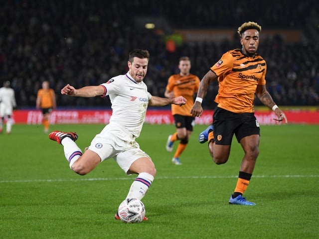 Hull City boss Grant McCann remains hopeful that Mallik Wilks can still have a future at the KCOM Stadium as transfer talks continue with his parent club Barnsley. (Various)