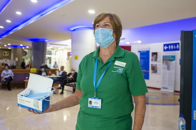 Face masks are provided for everyone walking through the door - and are also compulsory