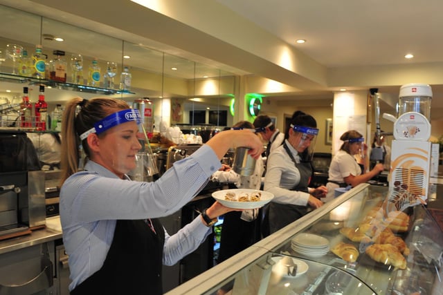 Staff wearing PPE while serving at Caffe Marconi.