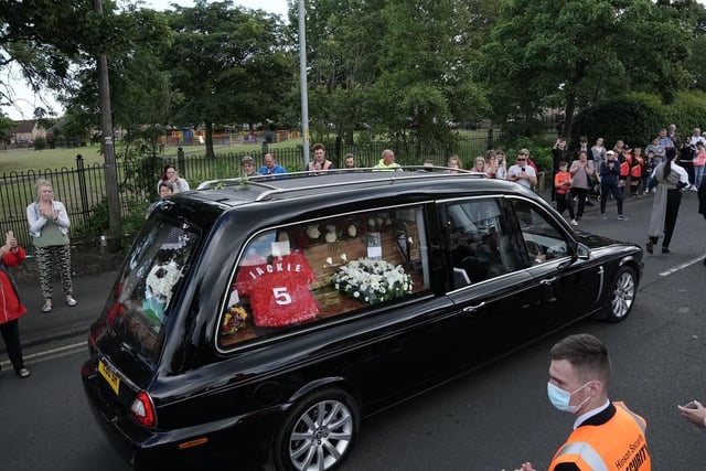 Fans wearing Leeds shirts, Newcastle United tops, Ireland strips and replica kits from his local side Ashington mingled together, waiting for their chance to pay their final respects.