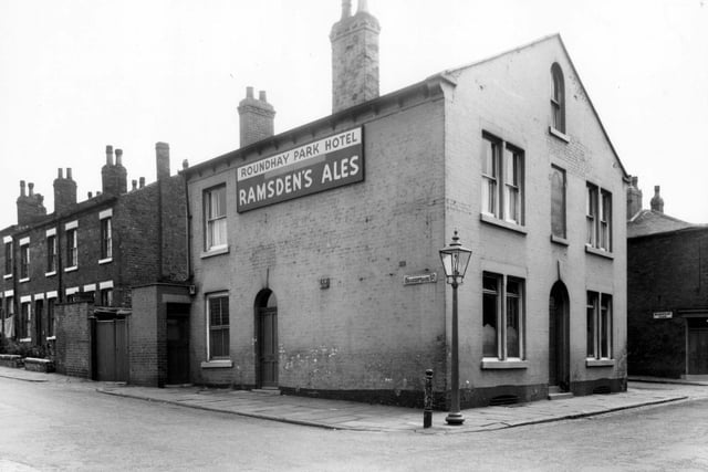 June 1960 The Roundhay Park Hotel, a Ramsden's public house, located on Burns Street. To the left is Shakespeare Street. Shakespeare Place can be seen on the right.