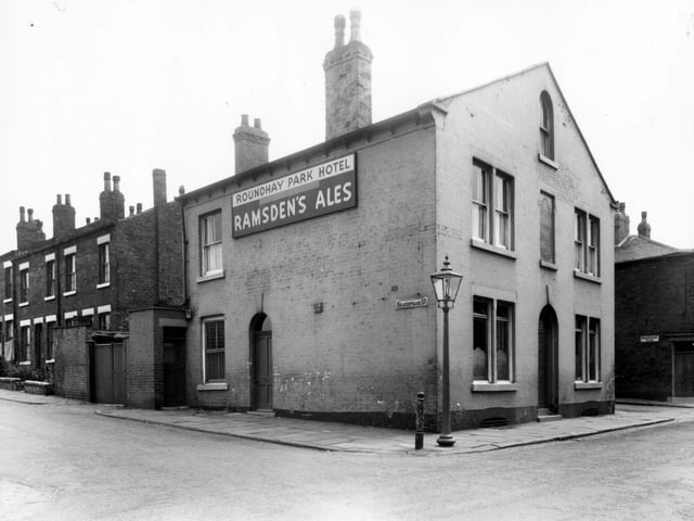 June 1960 The Roundhay Park Hotel, a Ramsden's public house, located on Burns Street. To the left is Shakespeare Street. Shakespeare Place can be seen on the right.