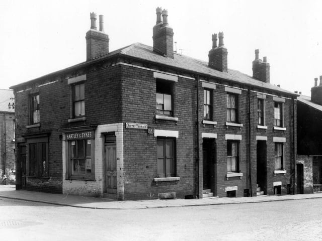 June 1960. Nippet Terrace looking from Burns Street, which features a butchers shop.