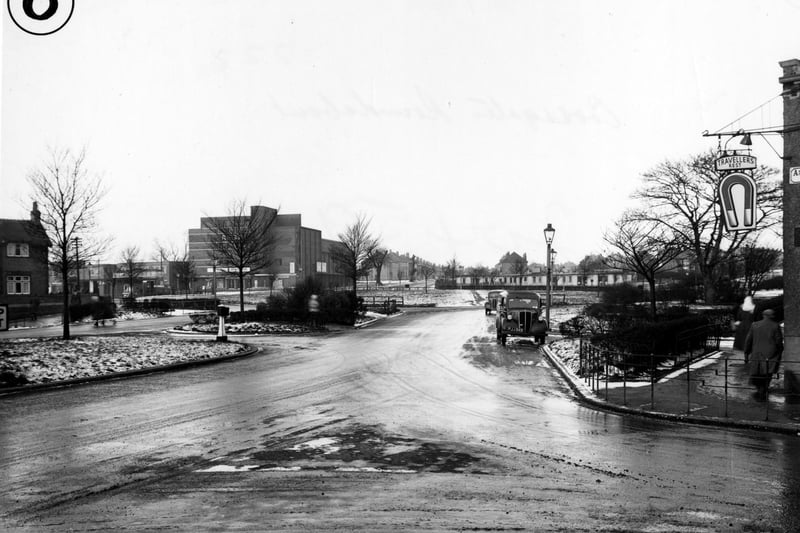 Cross Gates roundabout in January 1956.  In view is the Regal Cinema. The sign for the Travellers Rest pub can be seen on the right.