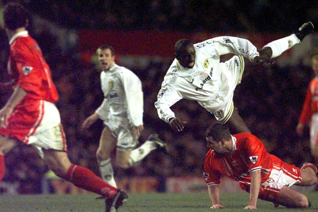 Jimmy Floyd-Hasselbaink takes a tumble over Middlesbrough's Gary Pallister.
