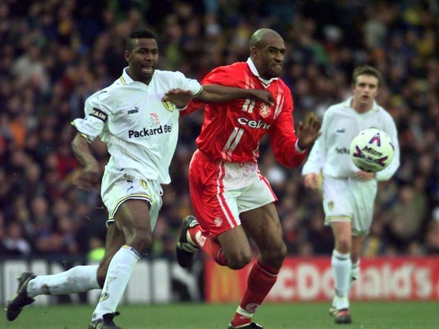 Lucas Radebe battles for the ball with Middlesbrough striker Brian Deane.