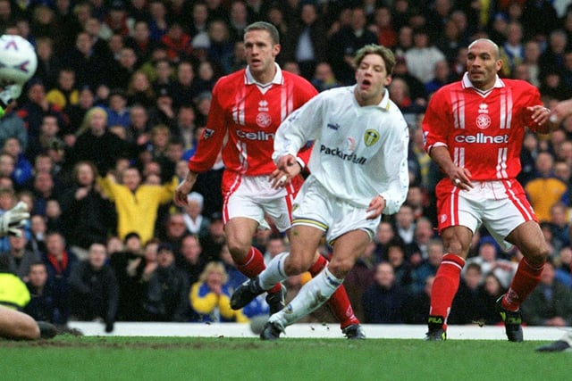 Alan Smith watches as his shot is pushed away to safety by Middlesbrough goalkeeper Mark Schwarzer.