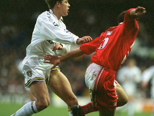 Alan Smith tries to run round Middlesbrough's Gianluca Festa.