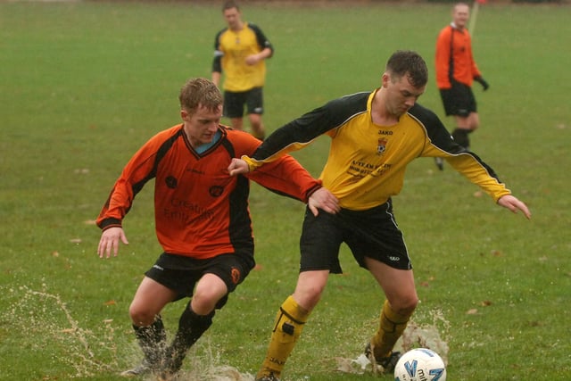 Wakefield Sunday League Division 3, West Bretton Tigers v Crown. Mark Liddle, left of West Bretton Tigers and Oliver Cosgrove of Crown duel.