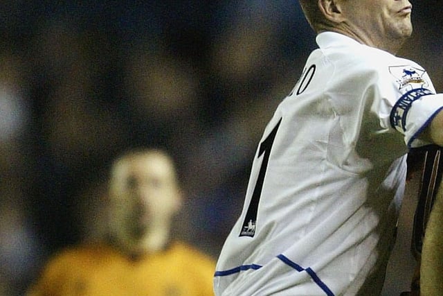 Wolves's Viorel Ganea shields the ball from Dominic Matteo.