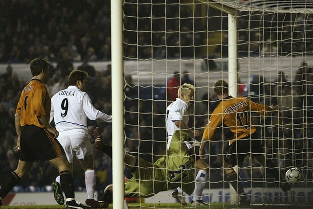 Striker Alan Smith opens the scoring.