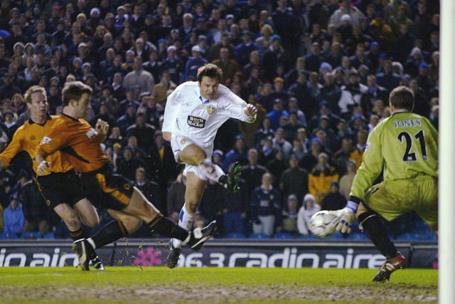 Striker Mark Viduka fires home Leeds United's fourth goal.