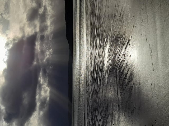 Light piercing the storm clouds