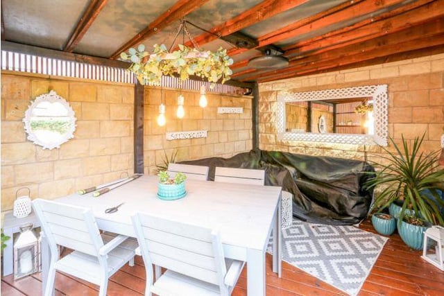A fantastic addition to the back garden is the Garden Room which is ideal for al fresco entertaining outside having a spacious sitting area and is fully lit with power and heating available,