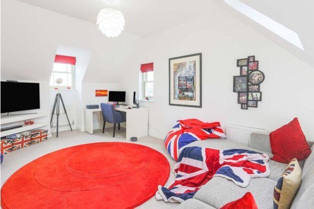 The final bedroom is a large space decorated with a Union Jack theme.