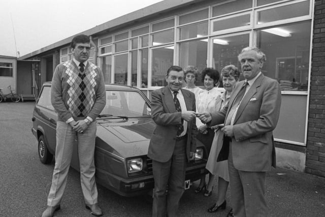 One of Garstang's biggest employers said a special thank you to five staff members with more than 180 years' service between them. The workers at up-market overall makers CCM Raven were given gifts of appreciation presented by company chairman Mr Michael Watson. Mr Watson, pictured far right, hands over the keys to a new car to Jim Callaghan, retiring after 51 years. Looking on are David Hodgson, left, Dorothy Taylor, Kathleen Wilcox, and Maureen Hindle