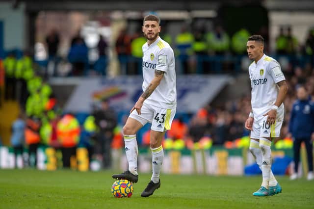 WHAT NEXT? Leeds United duo Mateusz Klich, left, and Raphinha, right, during Saturday's 4-0 defeat to Tottenham Hotspur at Elland Road. Picture by Bruce Rollinson.