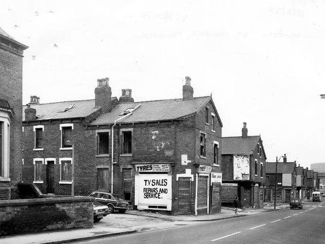 Domestic Street towards the railway viaduct. Houses and shops on Willoughby Avenue in the foreground, then Willoughby Grove, Willoughby Place and other Willoughbys, are all boarded up, due to be demolished.