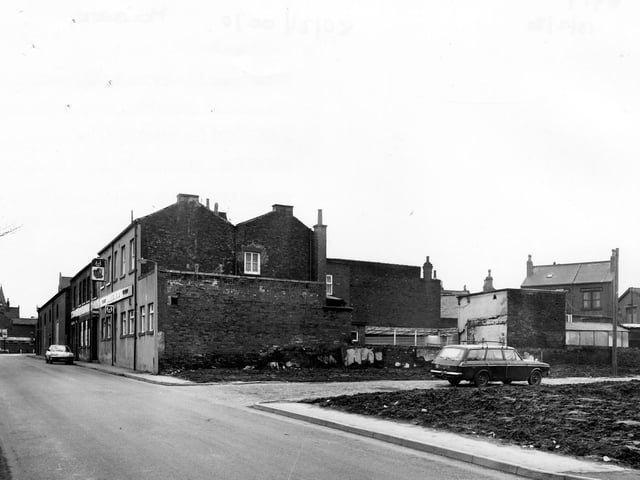 St. Matthew's Street showing the junction with Pleasant Mount in February 1980. The Bull's Head pub can be seen in the centre. In the foreground is an area of land where houses have been demolished.
