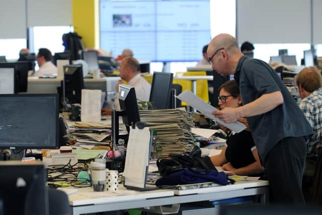 Inside a busy newsroom