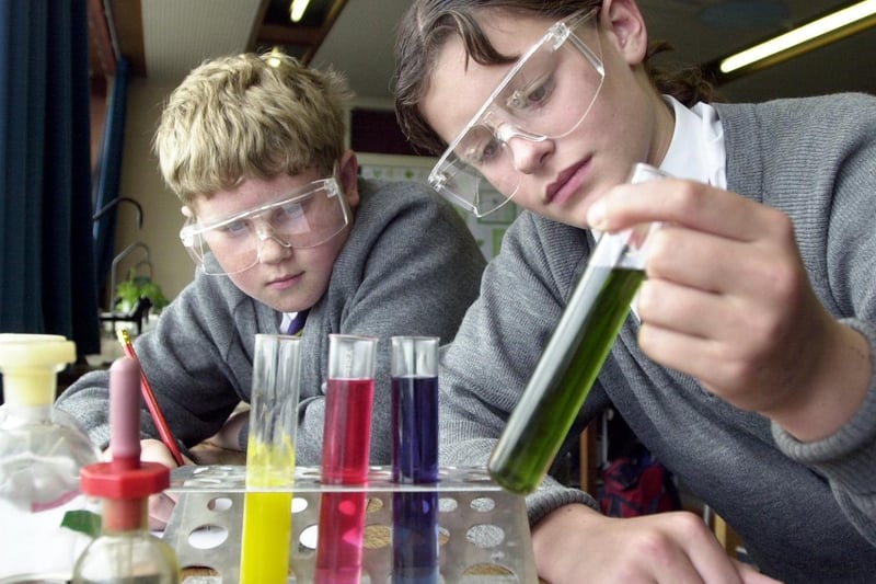 Corpus Christi RC High School gaining technology college status. Pictured in science class are Year 7 pupils Scott Varley (left) and Louise Hayes.