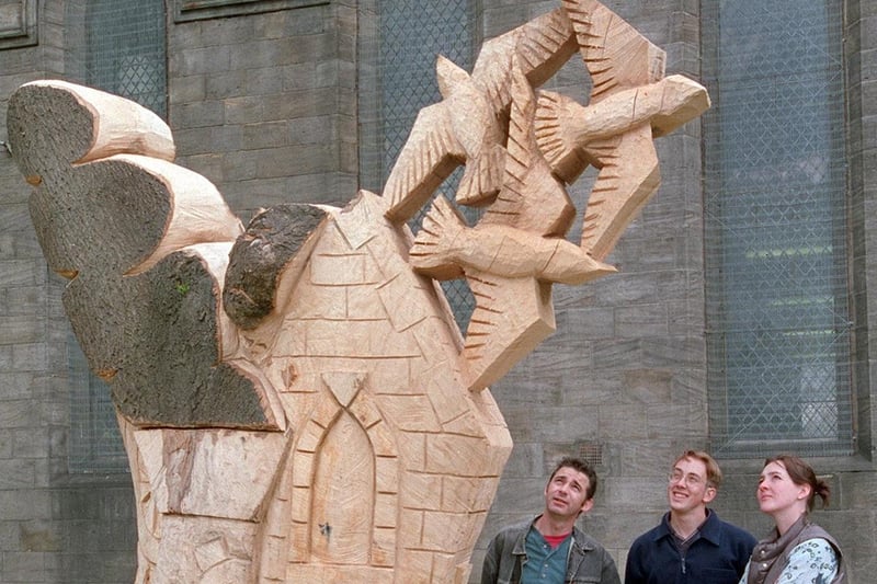 This sculpture was unveiled in the grounds of St. Matthew's Church in July 2000.
Pictured is sculptor Martin Heron (left) with Robert Whittaker and Kate McCartney, both of Groundwork Leeds.
