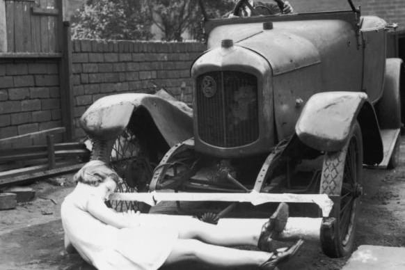 J T Griffin of Castleford demonstrates his road safety lifeguard which he claims will greatly reduce fatalities on the road. Rollers fitted beneath the radiators of vehicles prevent objects from going underneath the car.
