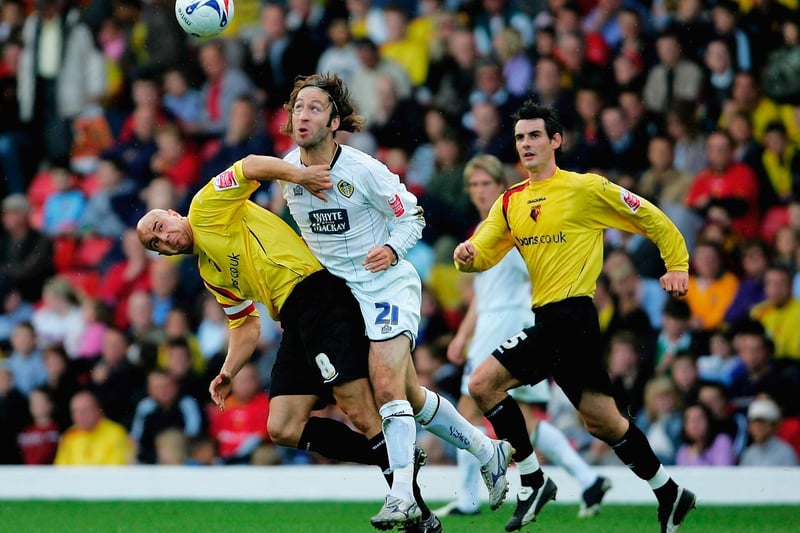 Shaun Derry battles with Watford's Gavin Mahon during the Championship clash at Vicarage Road in October 2005.