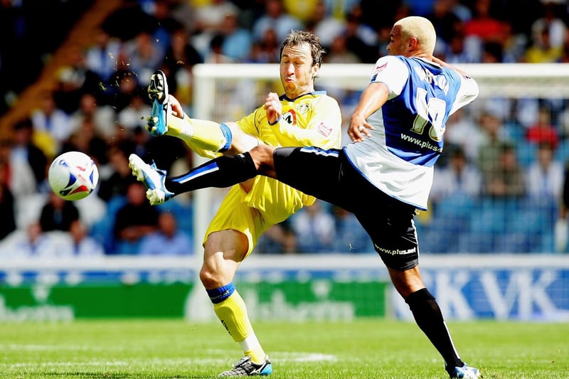 Shaun Derry and Sheffield Wednesday's Deon Burton challenge for the ball during the Championship clash at Hillsborough in August 2006.