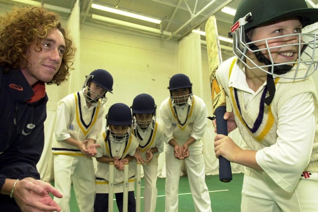 Yorkshire and England 'A' fast bowler Ryan Sidebottom keeps wicket with members of Hunslet Nelson Cricket Club whio were all wearing hew helmets. Pictured are  Adam Forman, Ifran Khan, Kasir Maroof, Adal Majid and Danny Calverley.