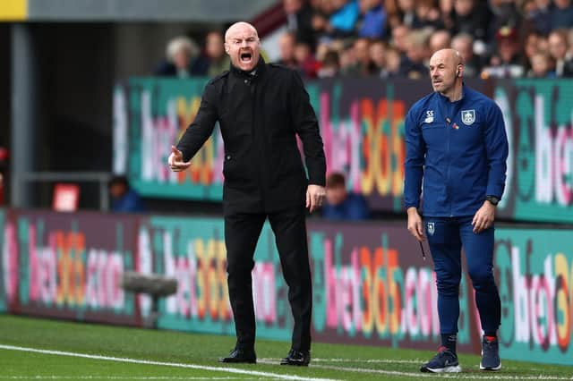 Sean Dyche, Manager of Burnley gives their team instructions during the Premier League match between Burnley and Brentford at Turf Moor on October 30, 2021 in Burnley, England.