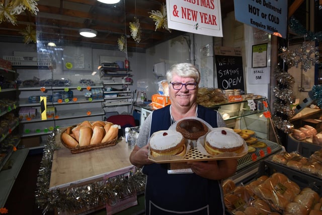 Wigan Indoor Market traders are open for food and essential items during lockdown 2.0 - some stalls were forced to close because of the Covid-19 restrictions and national lockdown.  Karen Foster owner of The Bread Basket at Wigan Indoor Market, November 2020.