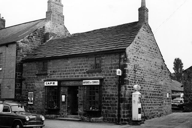 Stainthorp's Cafe and Antiques and Curios shop on Main Street at Thorner in August 1974. There is a petrol pump at the side of the building and a car parked on the road.