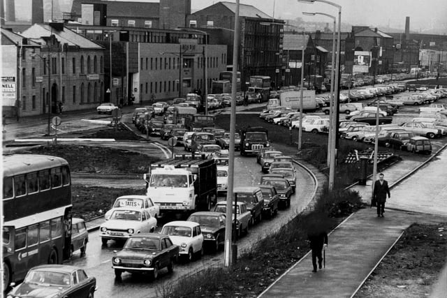 Traffic crawls along Kirkstall Road in January 1974.
