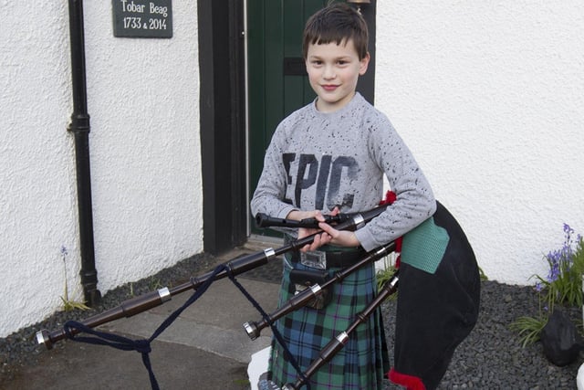 10 year old piper Gabriel Potts, preparing to play his pipes for the carers at 8pm on Thursday evening at The Row, Lauder. Gabriel plays his pipes every day at 1pm on the High Street in Lauder and  fortnightly plays at the local care home.