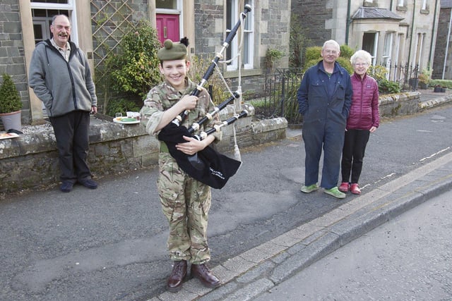 Army Cadet piper Angus Campbell 12,  from Galashiels, with Gordon Campbell and neighbours Iain and Ann McFadyen.