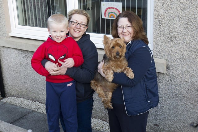 Matthew and Victoria Ferguson with Janet McDougal and Archie the dog.
