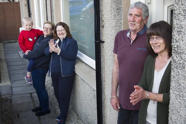 Matthew and Victoria Ferguson, Janet McDougal, with neighbours Colin and Heather Miller in Galashiels.