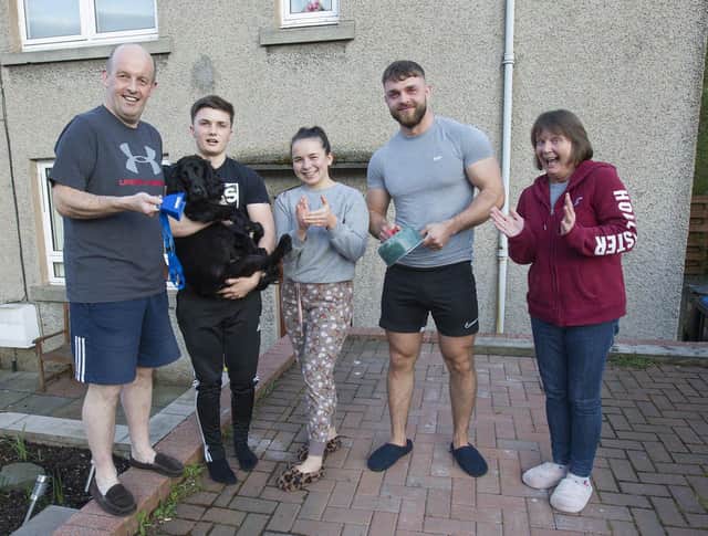 Hume family from Galashiels, Raymond, Andrew, Hudson the pooch, Ciara, Ross with the muscles and Sarah