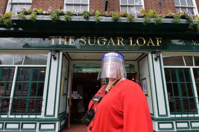 Open for business...Claire Draper shift manager outside the Sugar Loaf in Market Harborough.