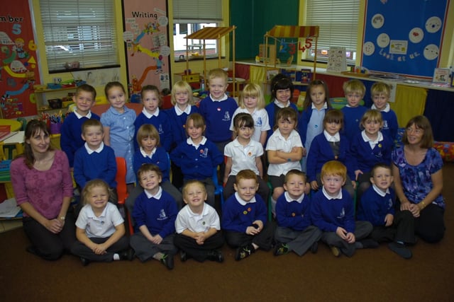 Pictured with the pupils are Cassie Mackay, teaching assistant, and Colette Vinter, class teacher.