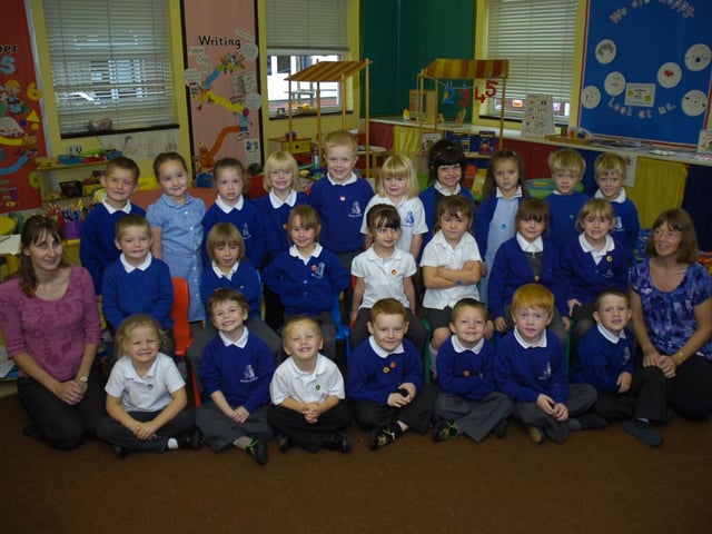 Pictured with the pupils are Cassie Mackay, teaching assistant, and Colette Vinter, class teacher.