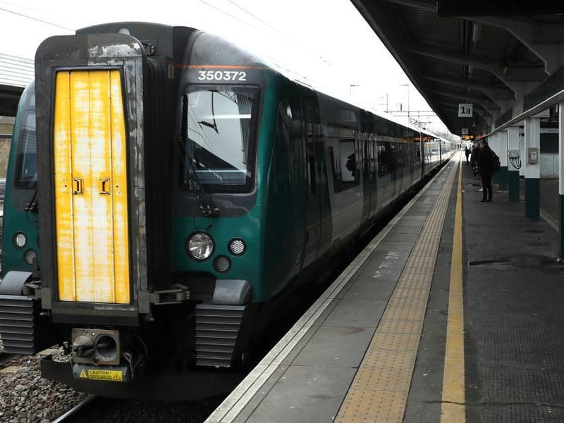 A London Northwestern service pulls in at a deserted Northampton station during lockdown in May last year