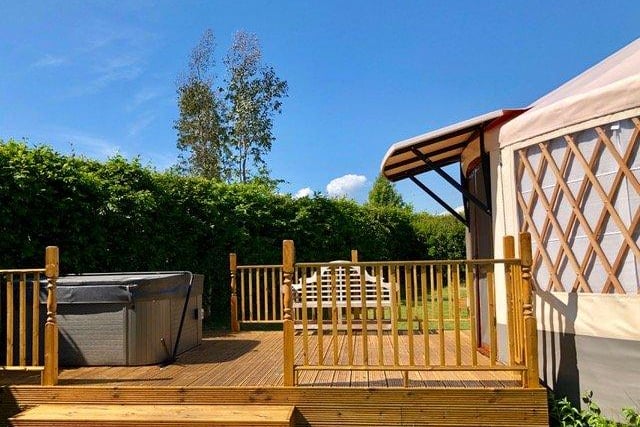 Situated on a family run working farm Graywood's American-inspired yurts boast extensive amenities including: full intergral kitchen and bathroom, four beds, dining area, TV and outside area with fire pit.