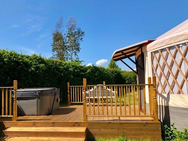 Situated on a family run working farm Graywood's American-inspired yurts boast extensive amenities including: full intergral kitchen and bathroom, four beds, dining area, TV and outside area with fire pit.