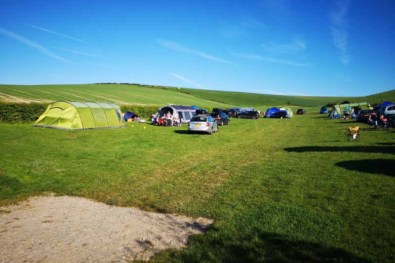 A back to basic, traditional camping experience on a working farm in the heart of the south downs, 25 pitches, no electric hookup, modern facilities. Three camping pods available to rent for a luxury experience.